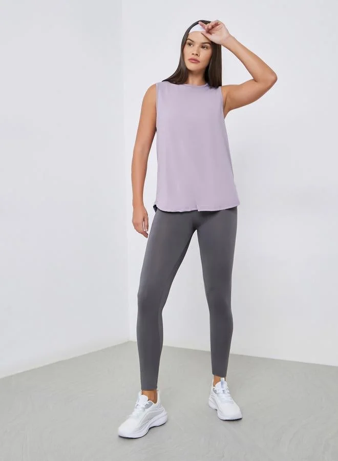 ستايلي اكتيف بلوزة بلا أكمام بقصة واسعة مع تفاصيل شبكية